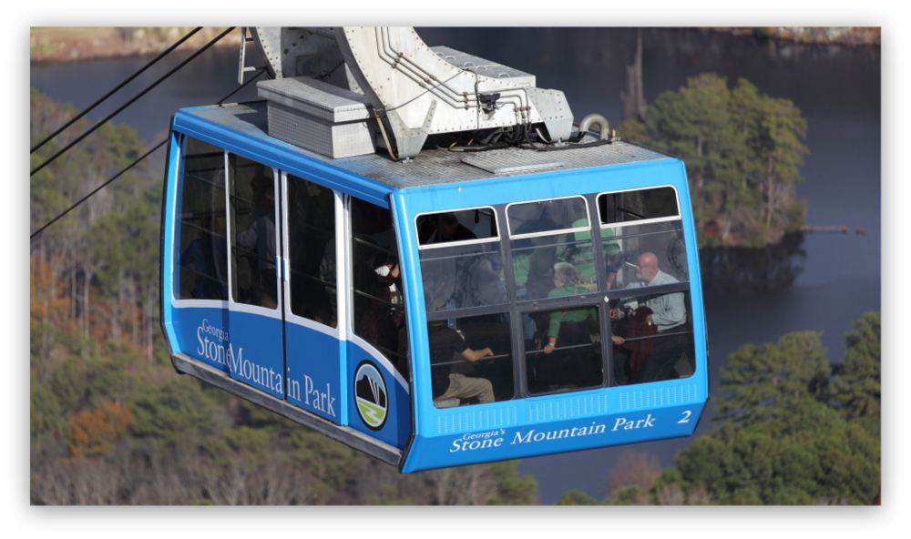Stone Mountain Park, Dec 03, 2012 - Another photo of the blue Summit Skyride/Skylift car descending from the top of Stone Mountain